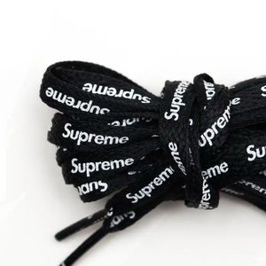 Surpreme and Nike shoe laces in the color black and white